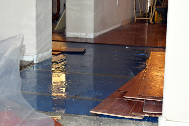 Professional Water Damage Restoration technician working in Cedarhurst, NY